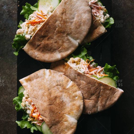 A close up of two sandwiches on a plate