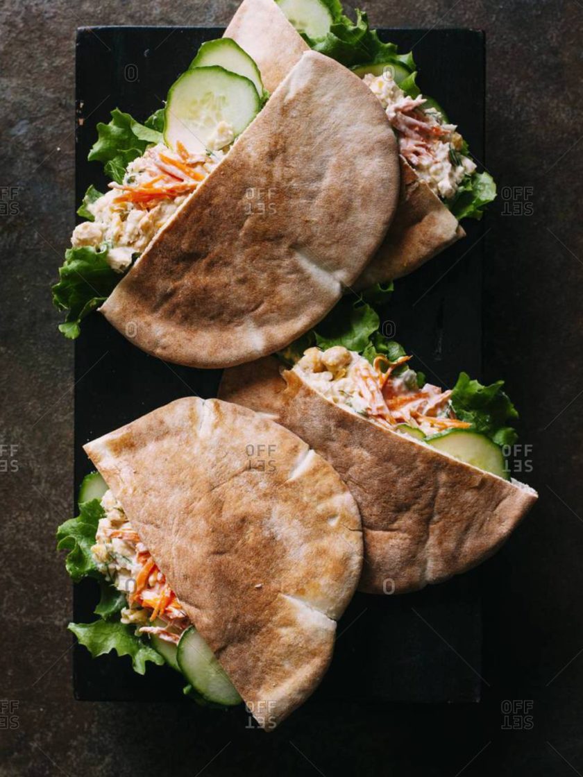 A close up of two sandwiches on a plate