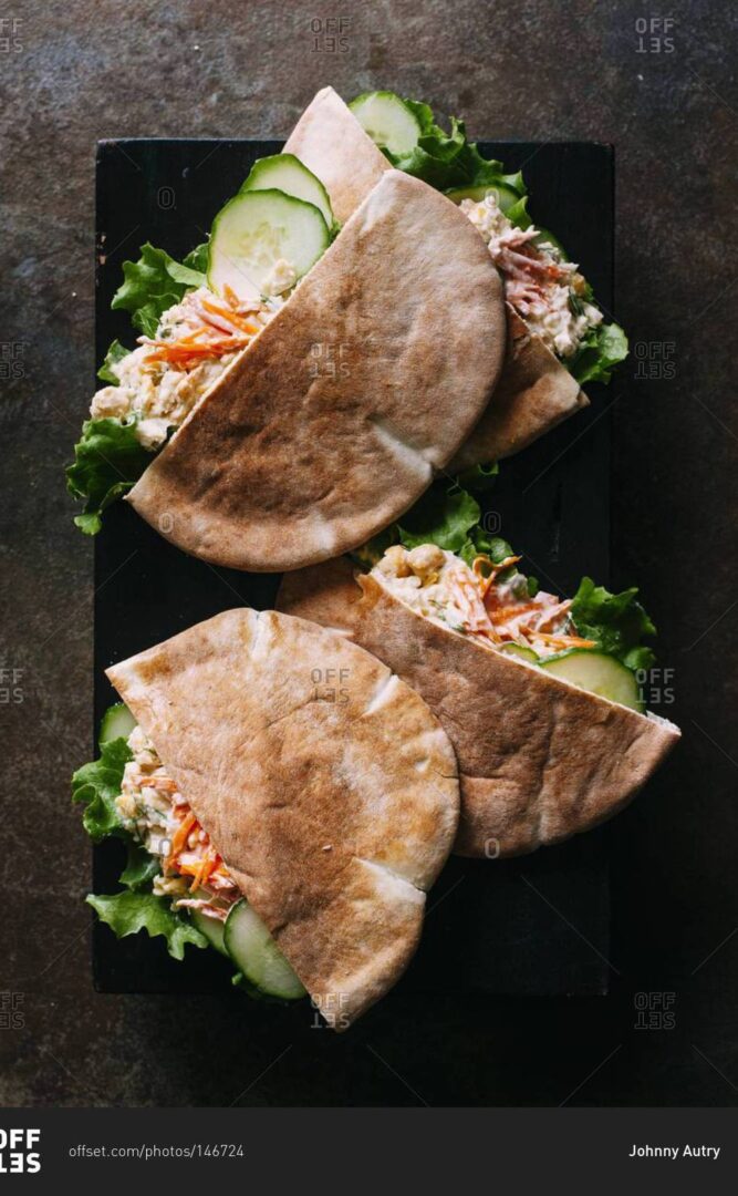 A close up of two sandwiches on a plate