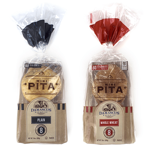 Two bags of pita bread are shown in a variety of colors.